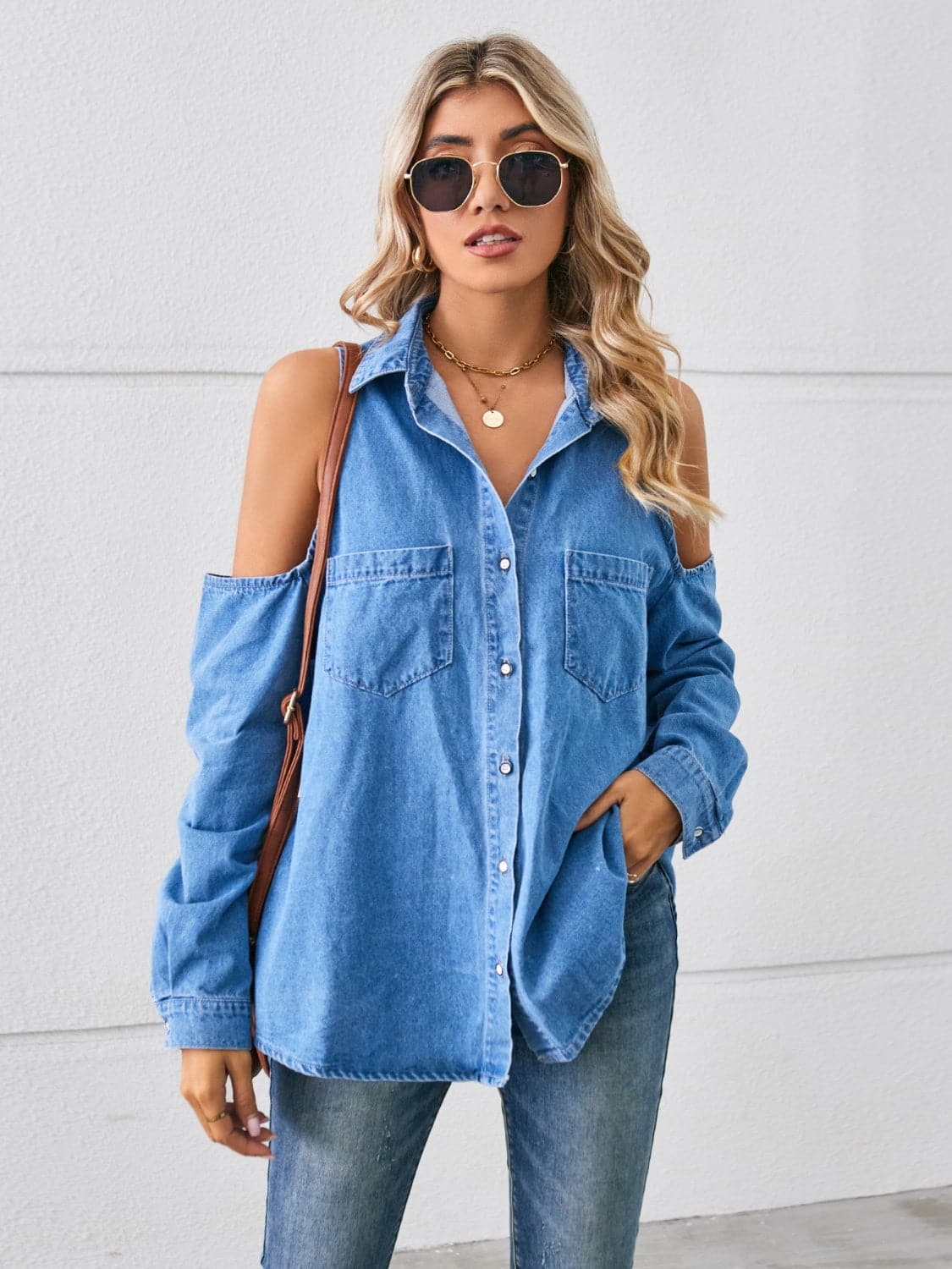 Cold Shoulder Pocketed Button Up Denim Jacket.