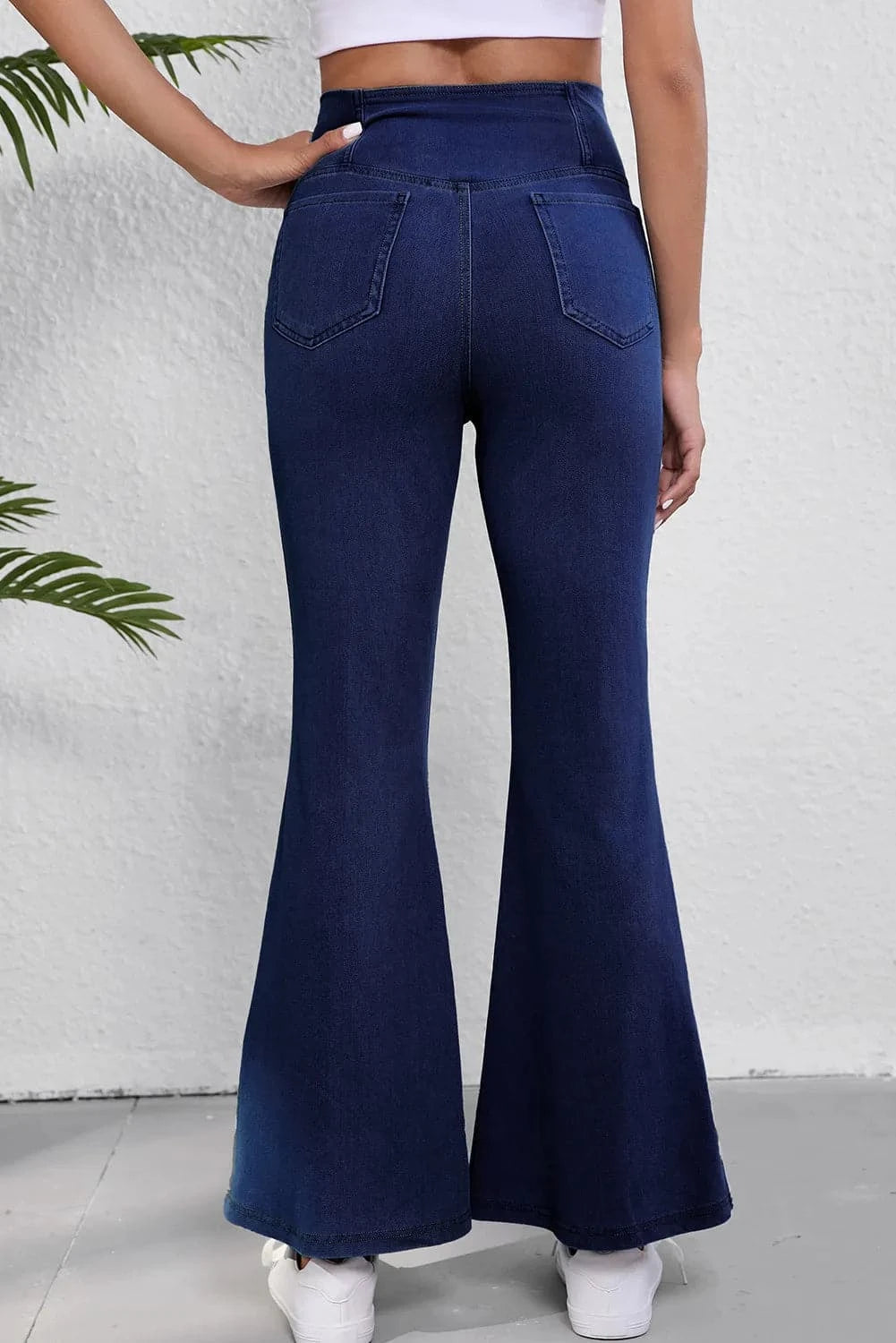 Asymmetric waist flare jeans