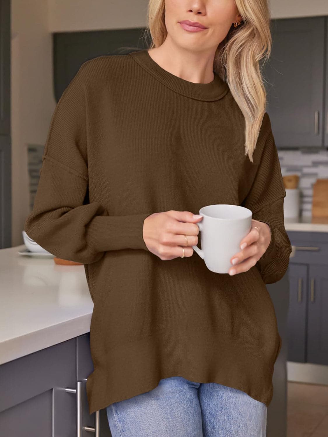 Dropped shoulder sweater with stylish slits