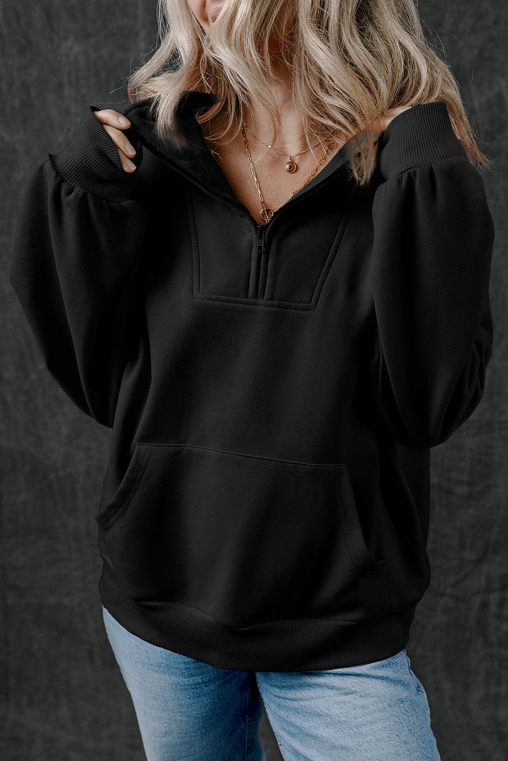 Chic black zip-up sweatshirt with kangaroo pockets