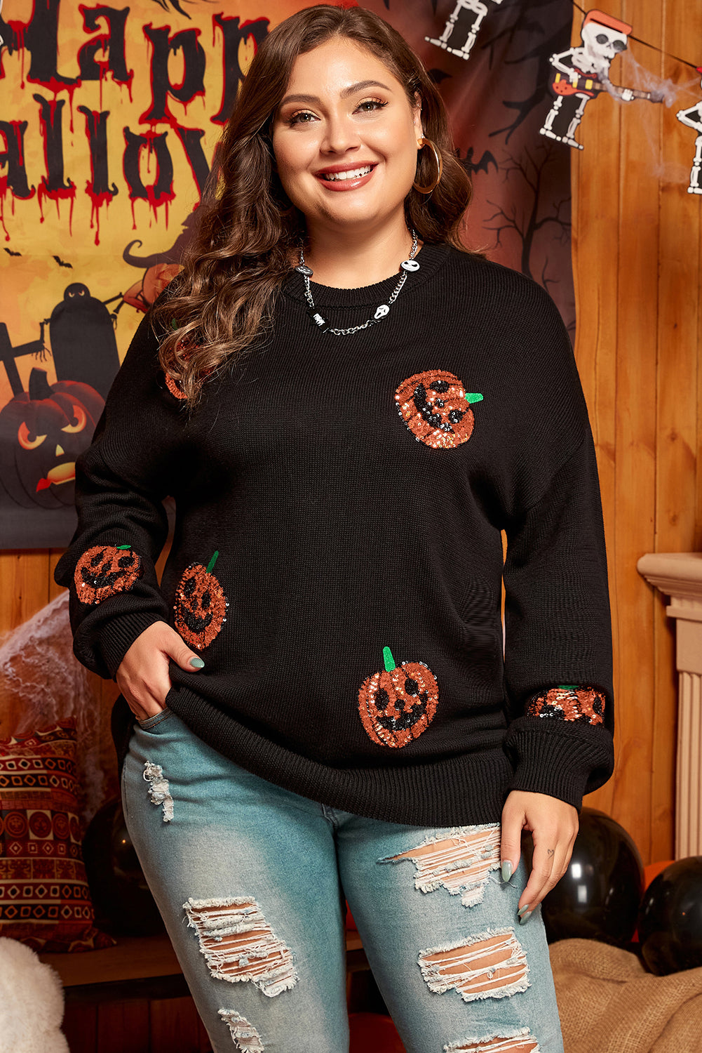 Chic black sequined pumpkin sweater