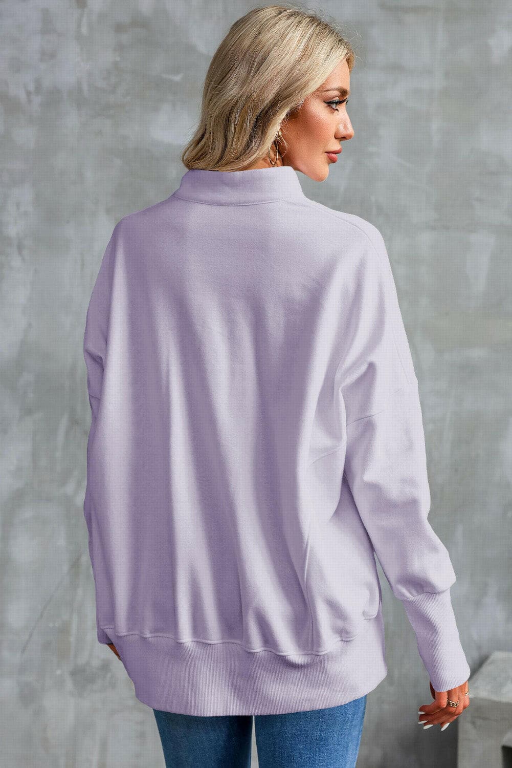 Half Zip Pocketed Dropped Shoulder Sweatshirt.