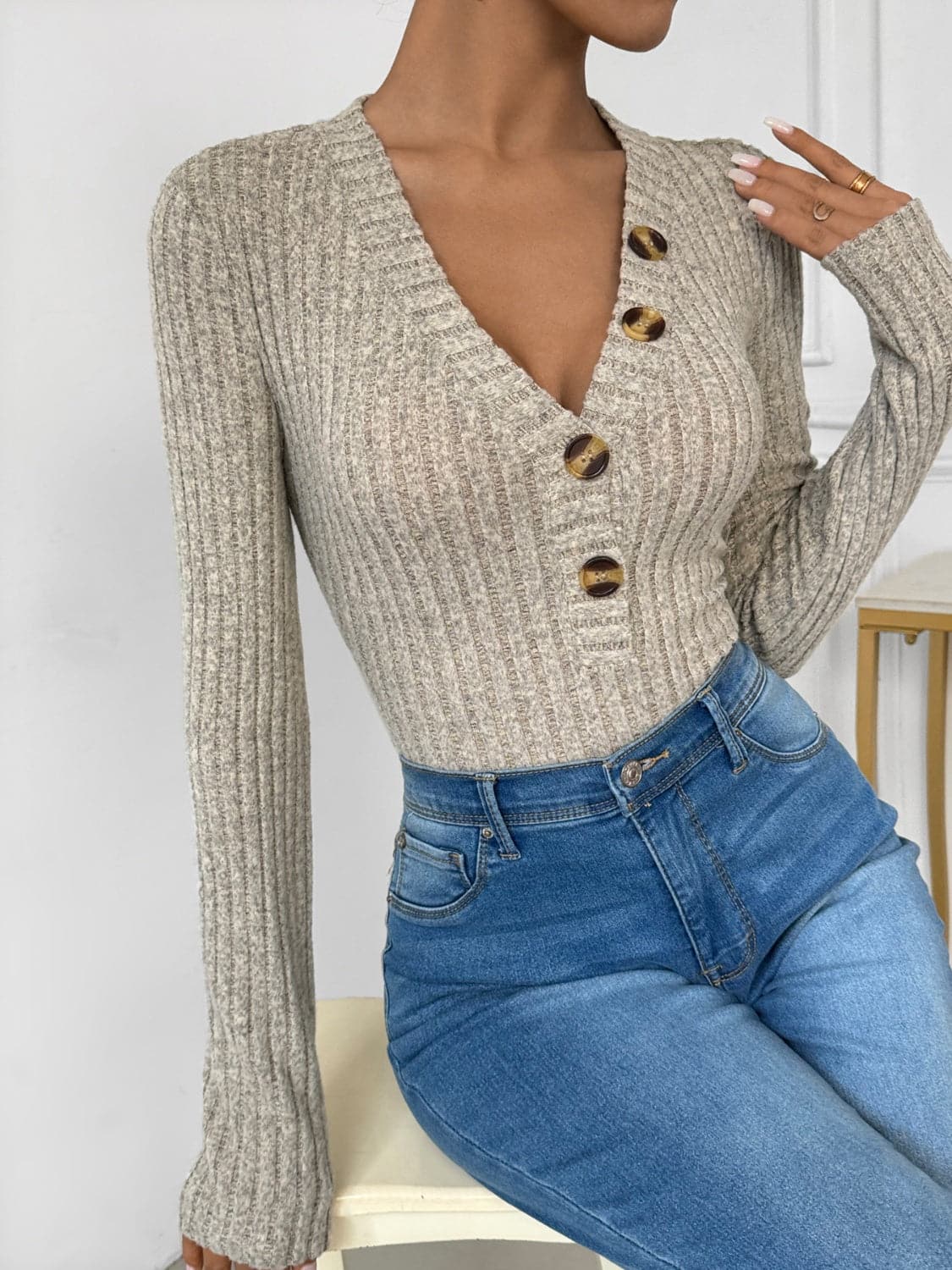 Chic V-neck long sleeve bodysuit with decorative buttons