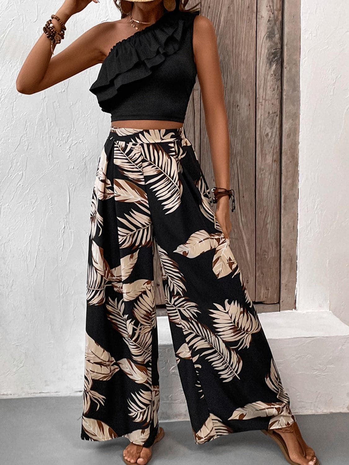 Ruffled Sleeveless Top and Printed Pants Set.