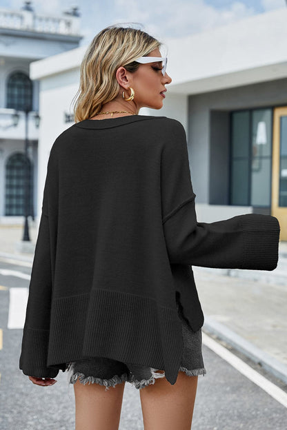 High-Low Slit Round Neck Long Sleeve Sweater.