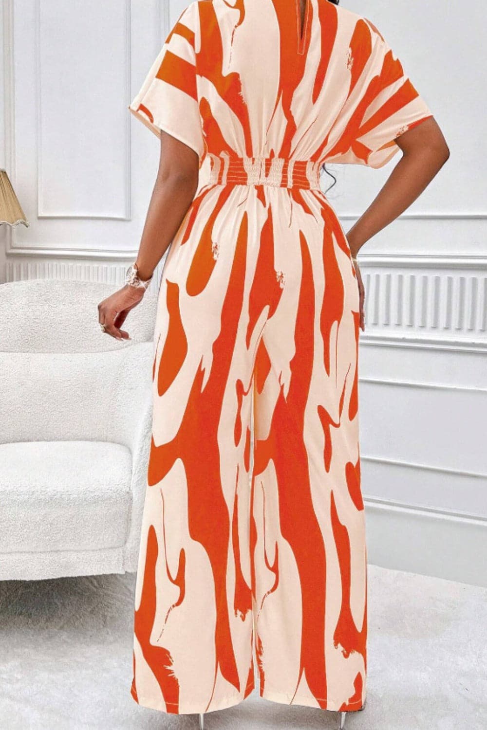 Printed V-Neck Short Sleeve Wide Leg Jumpsuit.