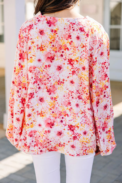 Charming pink floral v-neck blouse with bubble sleeves