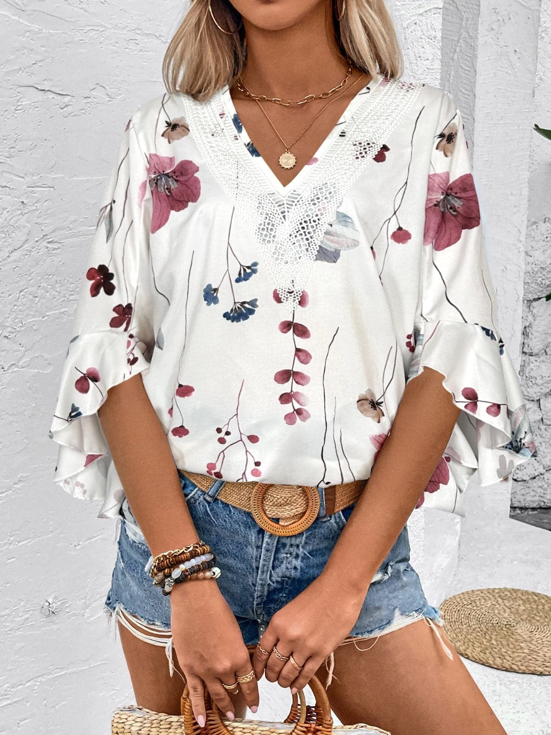 Ruffled Printed V-Neck Half Sleeve Blouse.