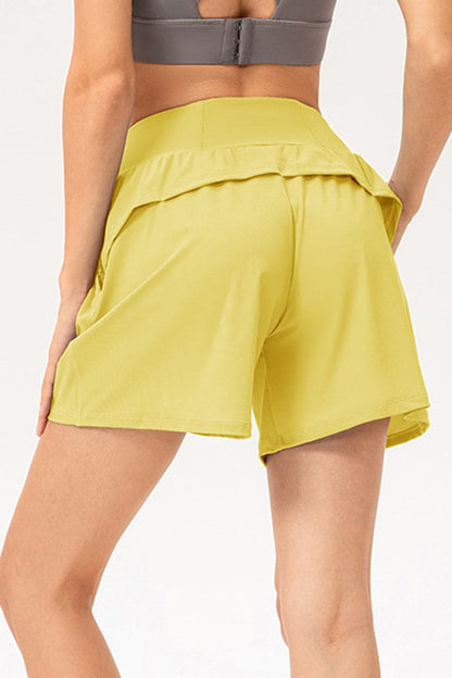 Pocketed Elastic Waist Active Shorts.