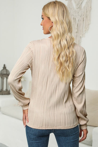 Textured Round Neck Long Sleeve Blouse.