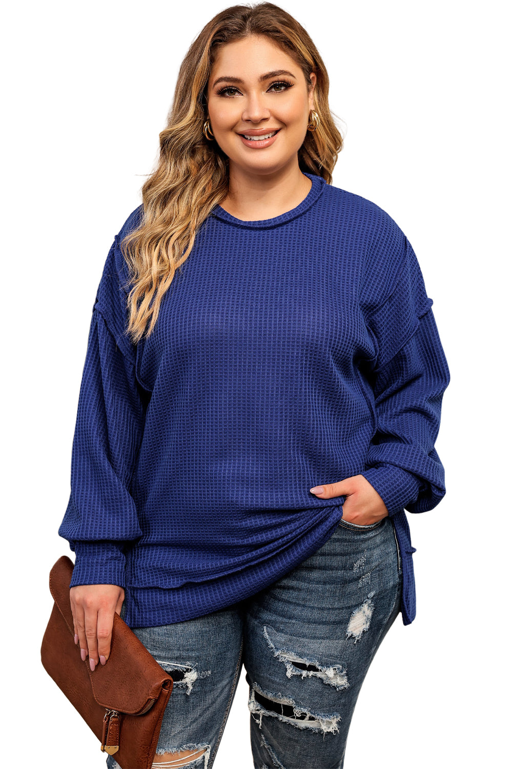 Cozy blue oversized waffle knit top with exposed seams