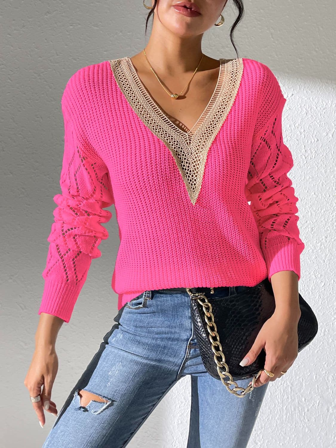 Chic openwork v-neck sweater with long sleeves