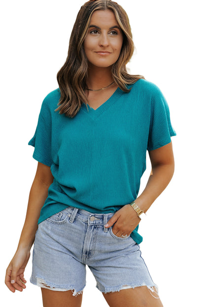 Crinkled blue sapphire V-neck T-shirt with wide sleeves