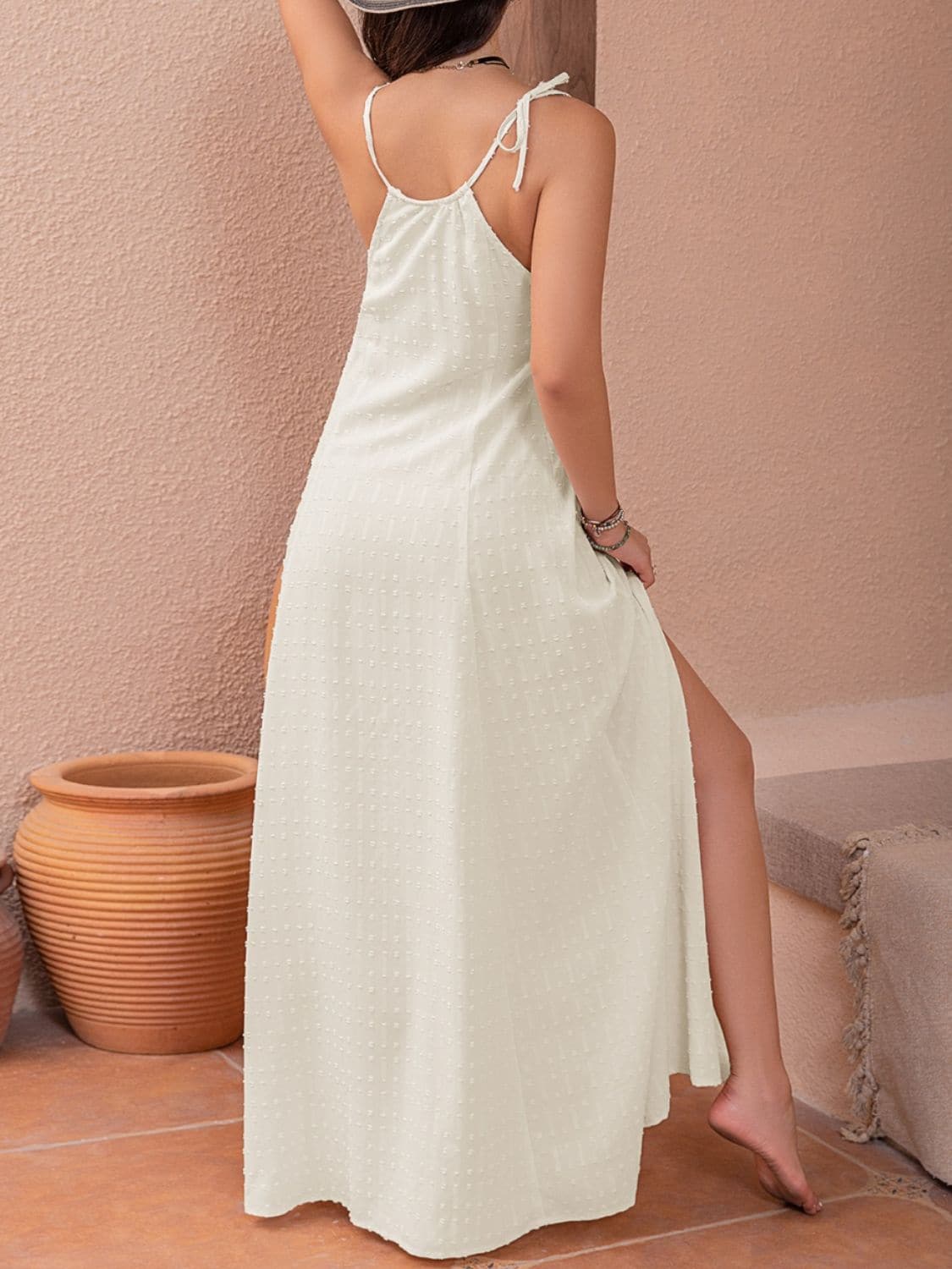 Charming Swiss dot sleeveless maxi dress with cutout detailing