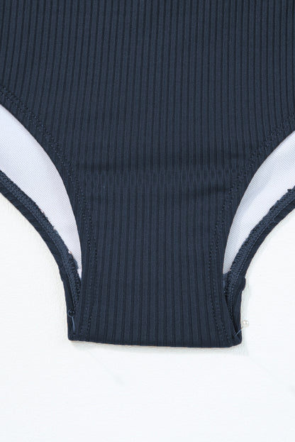 Navy blue ribbed cutout monokini with adjustable drawstring sides