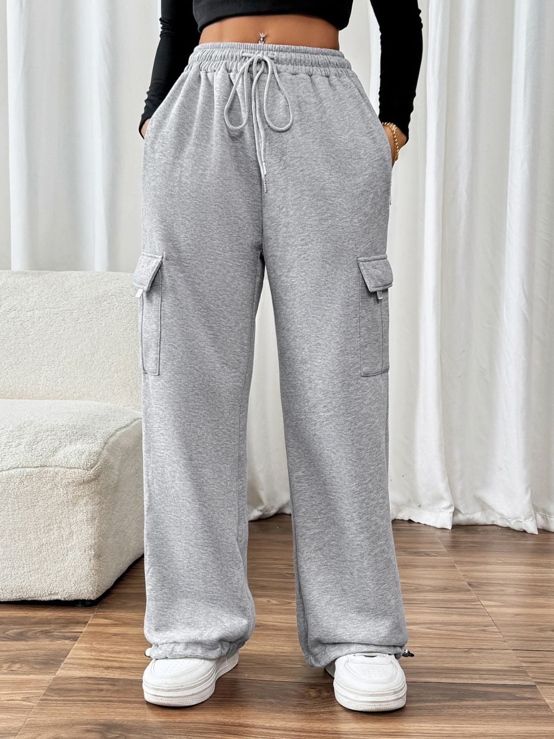 Perfee Drawstring Elastic Waist Joggers with PocketsFeatures: Drawstring, Pocketed
Sheer: Opaque
Material composition: 85% polyester, 15% cotton
Care instructions: Machine wash cold. Tumble dry low.
Imported


Size
USLove Salve Perfee Drawstring Elastic Waist JoggersPants