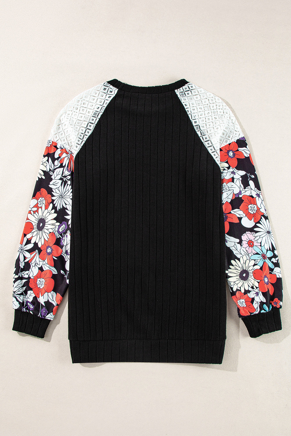 Elegant black floral patchwork ribbed blouse with long sleeves