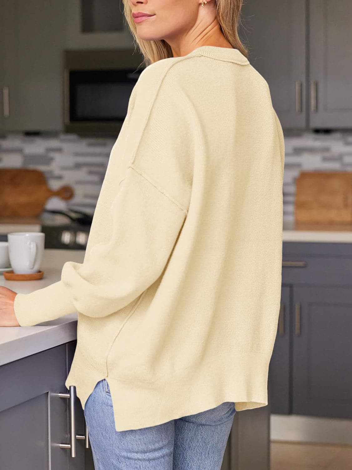 Stylish slit shoulder sweater