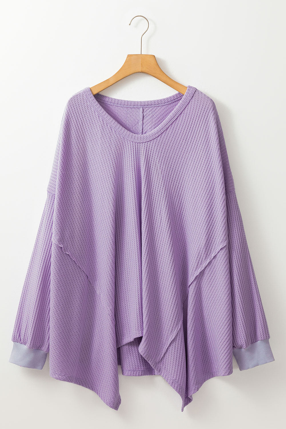 Flattering orchid petal plus size waffle knit top with exposed seams