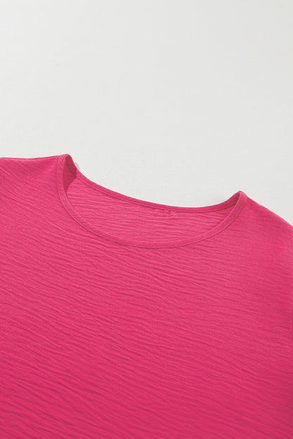 Playful pink ruffled short sleeve top for plus sizes