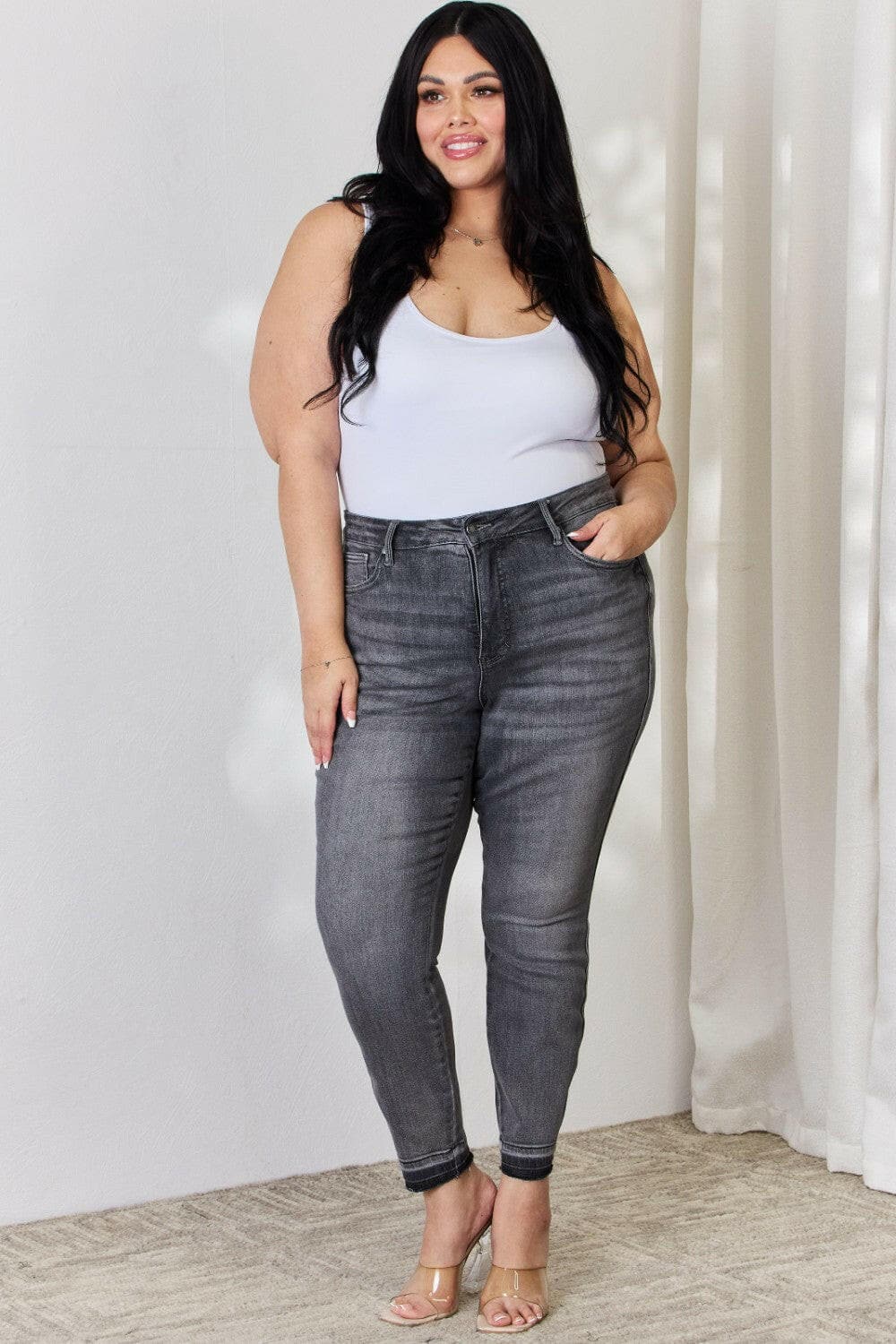 Judy Blue Full Size High Waist Tummy Control Release Hem Skinny Jeans.