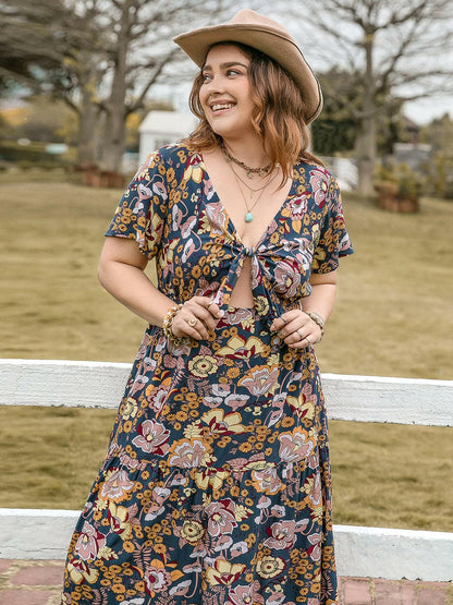 Plus Size Tied Printed Short Sleeve Midi DressPlus Size Tied Printed Short Sleeve Midi Dress
 Introducing our Plus Size Tied Printed Short Sleeve Midi Dress, the perfect blend of style and comfort for the modernLove Salve Size Tied Printed Short Sleeve Midi Dressjust arrived