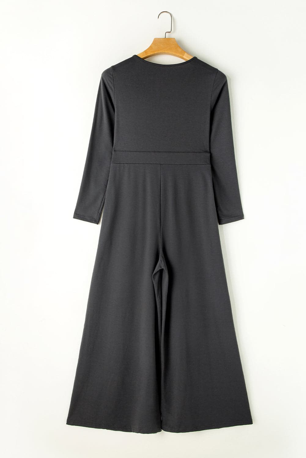 Pocketed Long Sleeve Wide Leg Jumpsuit.