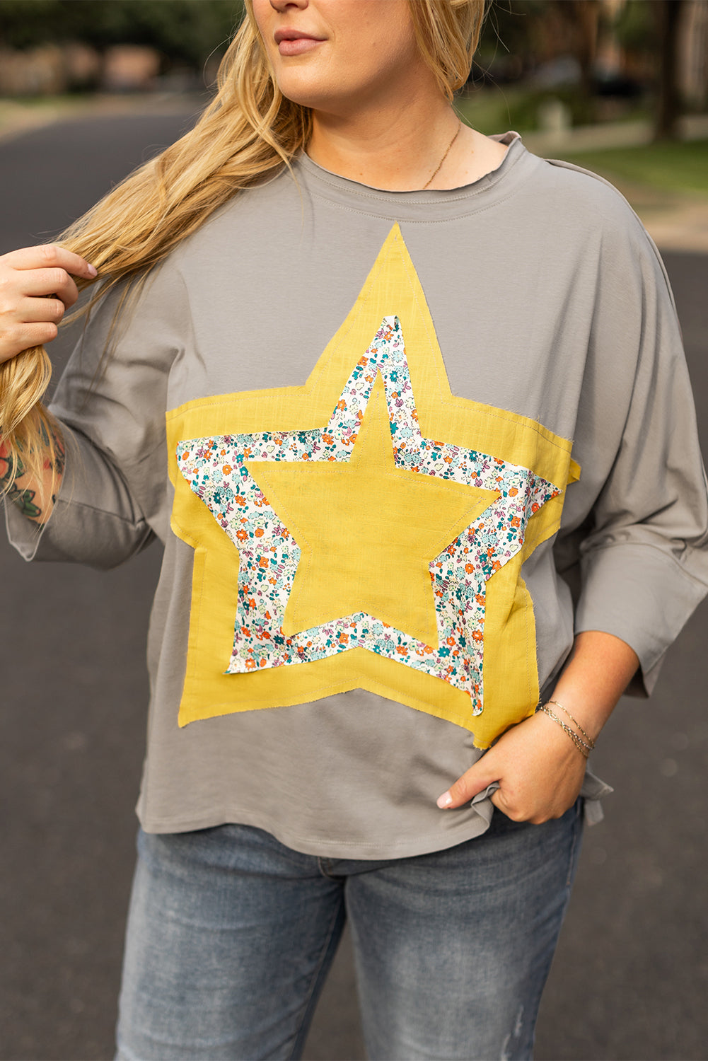 Chic medium grey floral star patch top with 3/4 sleeves in plus sizes