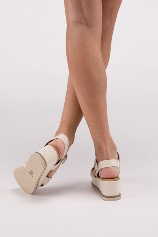 Clever-S Cross Strap Wedge Sandals.