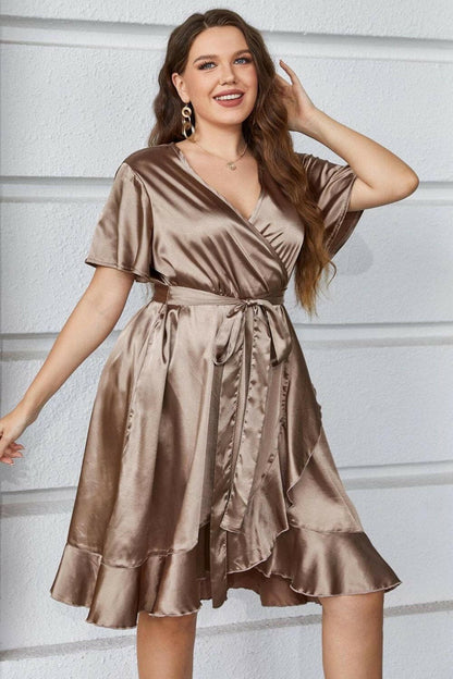 Plus Size Belted Ruffled Surplice DressEnhance Your Style with the Plus Size Belted Ruffled Surplice Dress
 
 
Style: Chic and classy
 
Pattern: Solid
 
Neckline: Surplice
 
Length: Knee Length
 
Sleeve LLove Salve Size Belted Ruffled Surplice DressCocktail Dresses