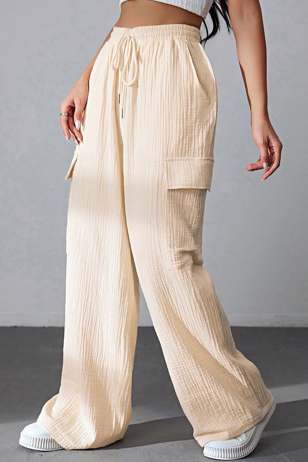 Drawstring Pocketed Wide Leg Pants.