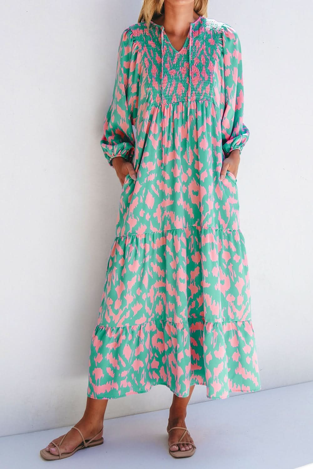 Floral smocked tie neck long sleeve dress