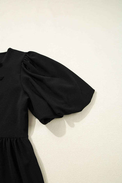 Chic Black Peplum Blouse with Puff Sleeves and Bowknot Detail