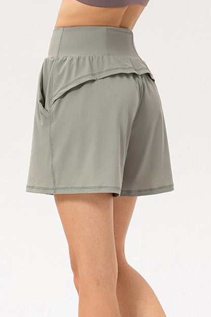 Pocketed Elastic Waist Active Shorts.