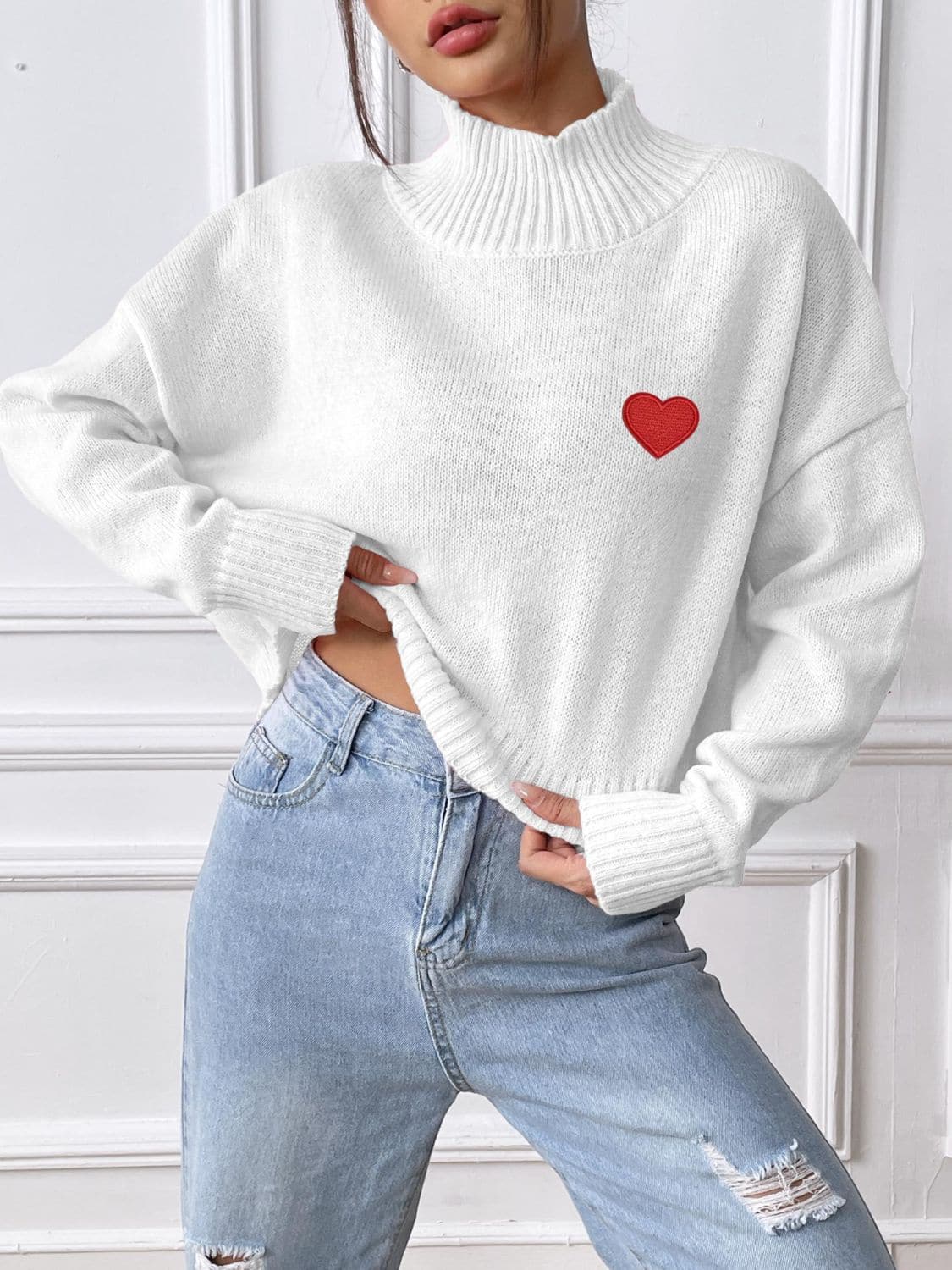 Charming heart turtleneck sweater for cozy elegance