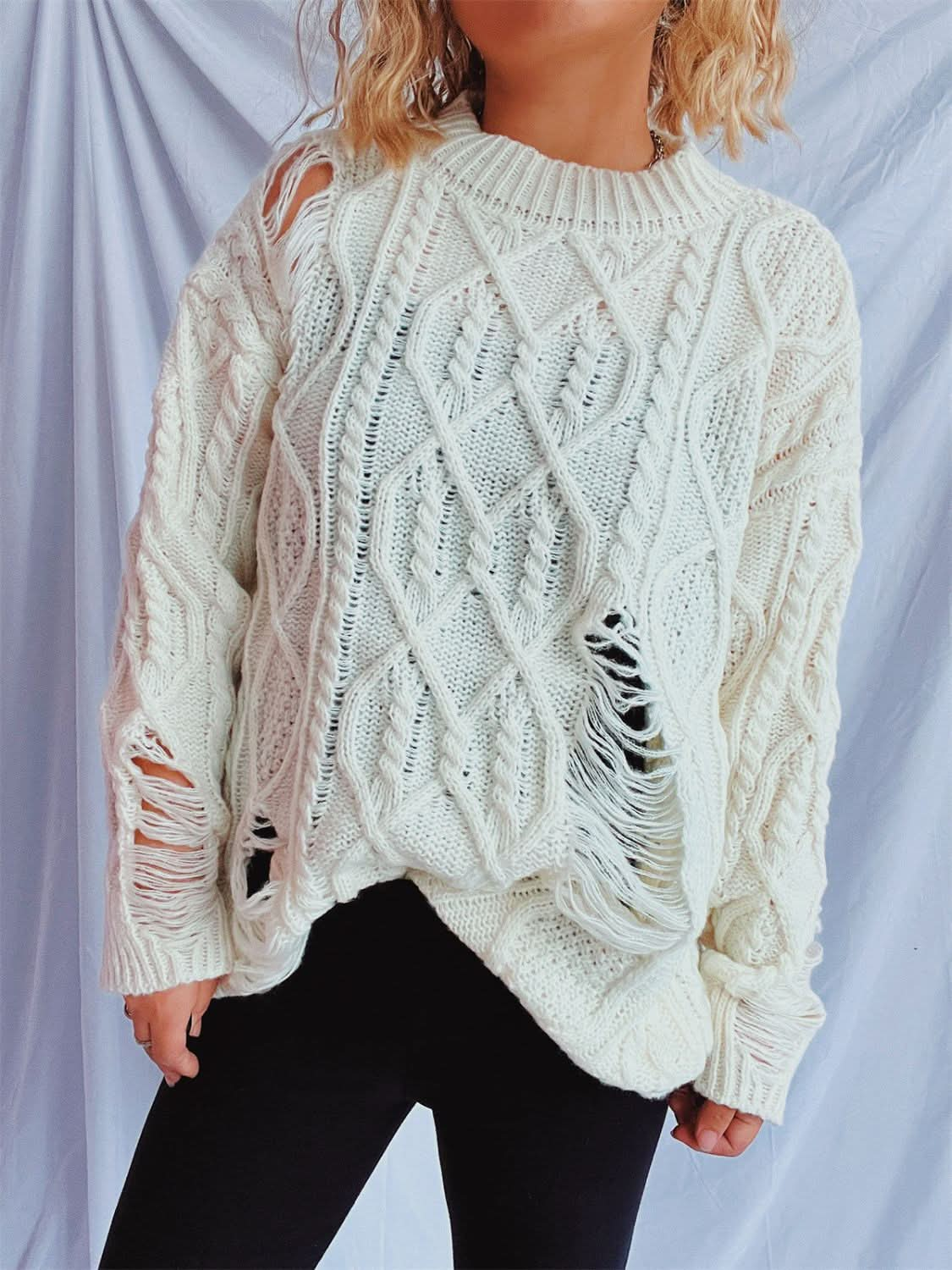 Chic distressed cable-knit sweater