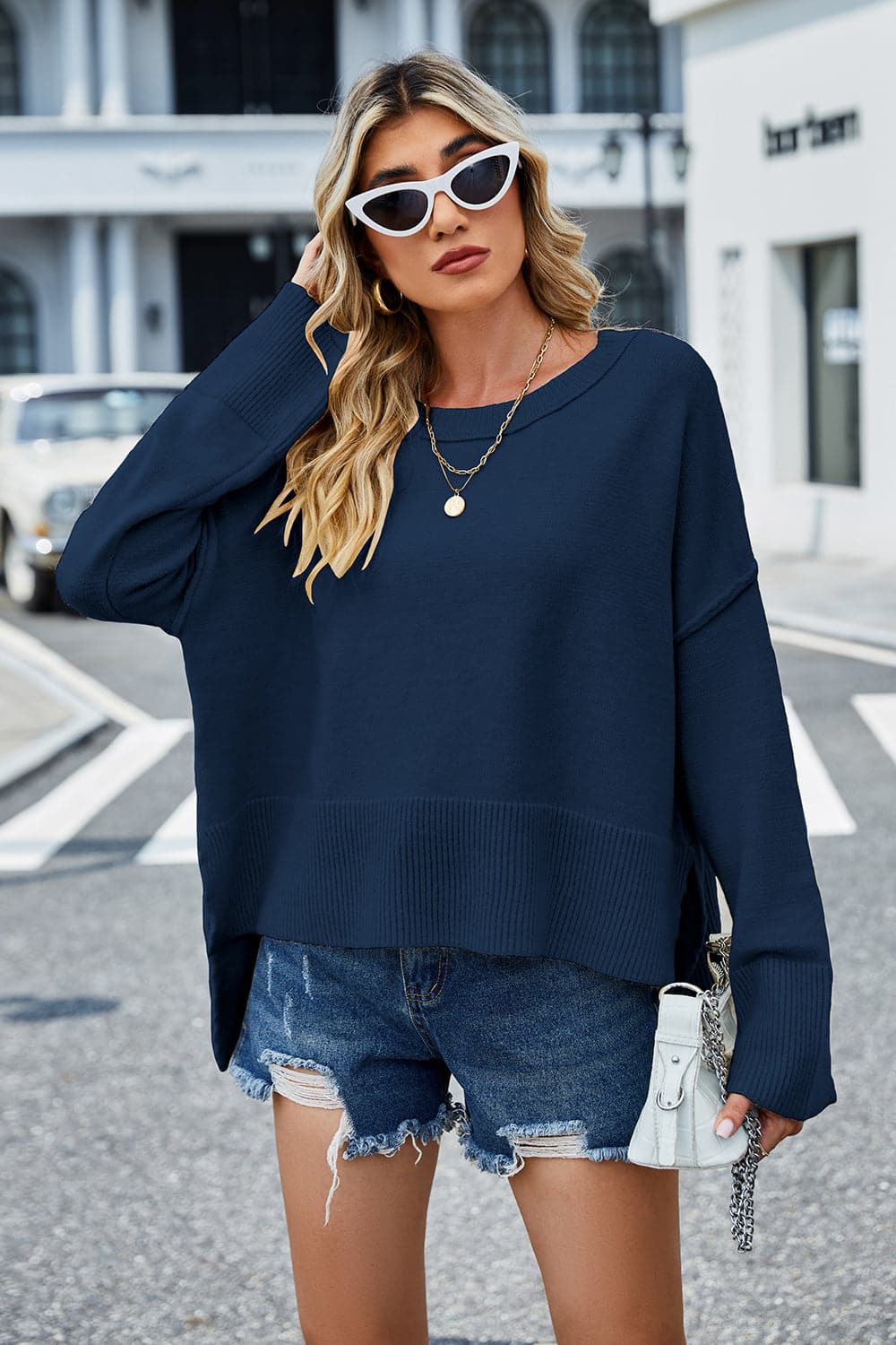 High-Low Slit Round Neck Long Sleeve Sweater.