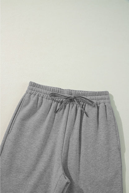 Light grey fleece pants with drawstring