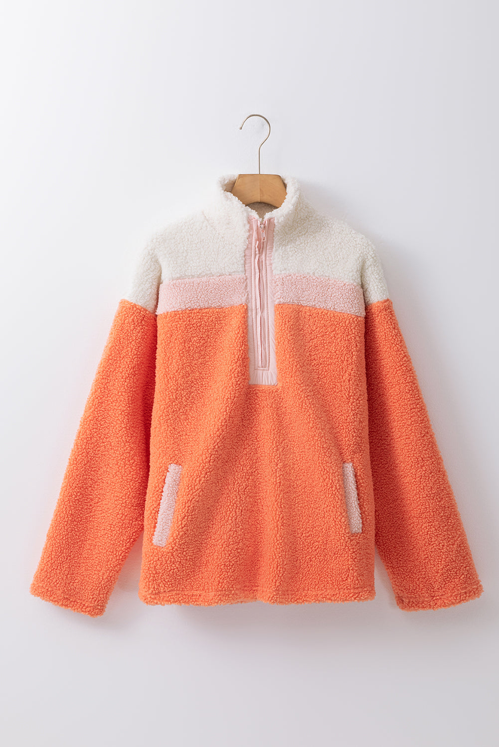 Cozy orange colorblock sherpa sweatshirt with half zipper and stand neck