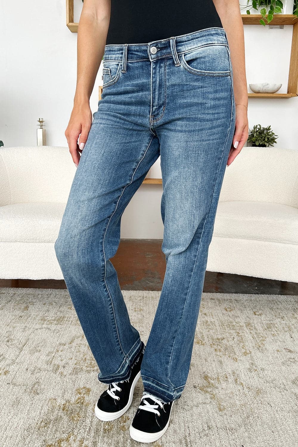 Trendy mid-rise release hem jeans by Judy Blue