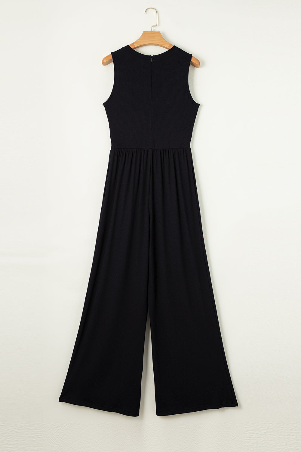 Chic black sleeveless jumpsuit with cinched waist and wide legs