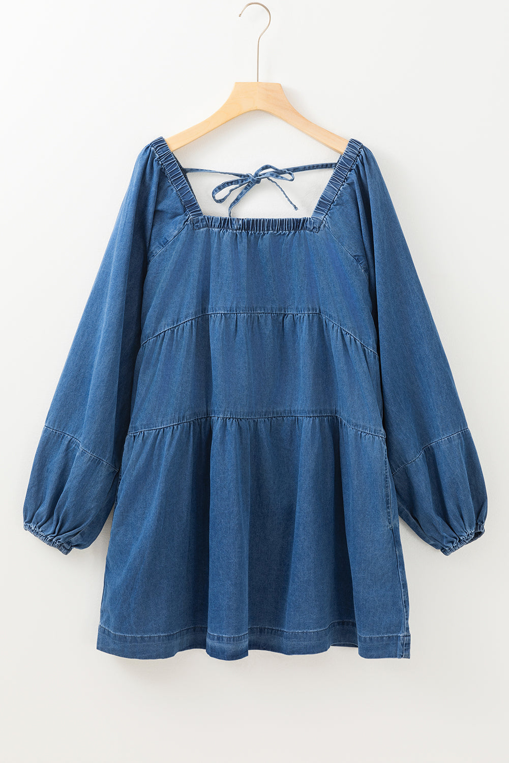 Dusk blue denim mini dress with square neckline and side pockets