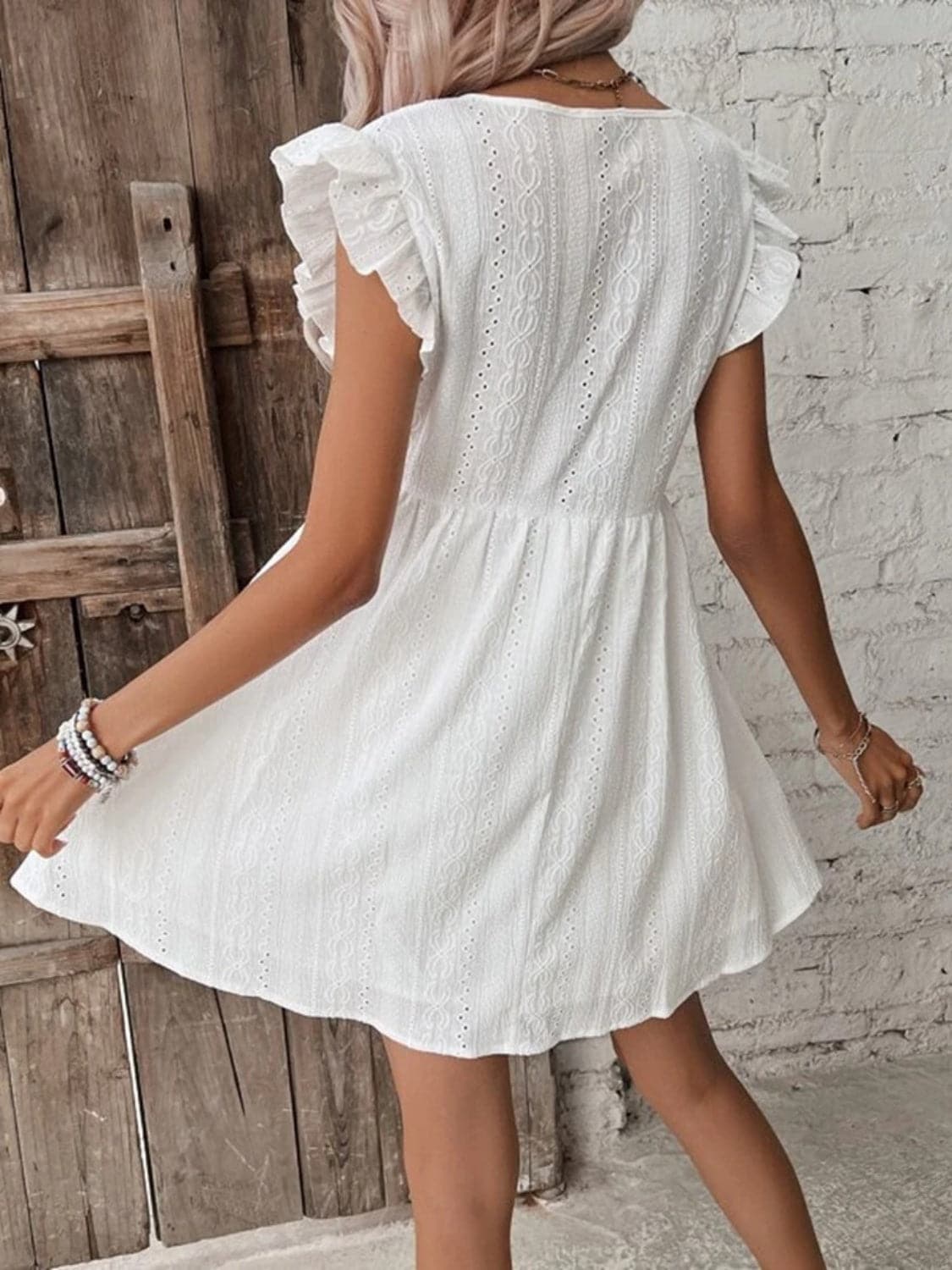 Eyelet Ruffled Cap Sleeve Mini Dress.