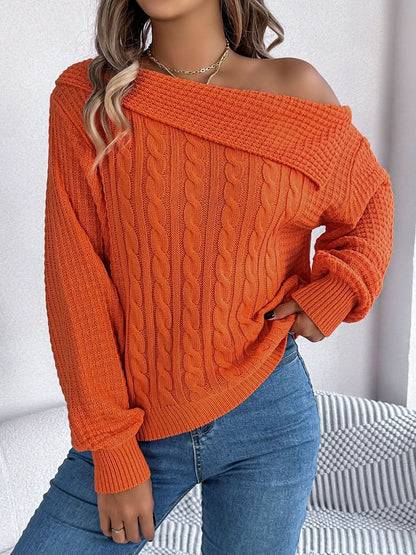 Asymmetrical cable-knit long sleeve sweater