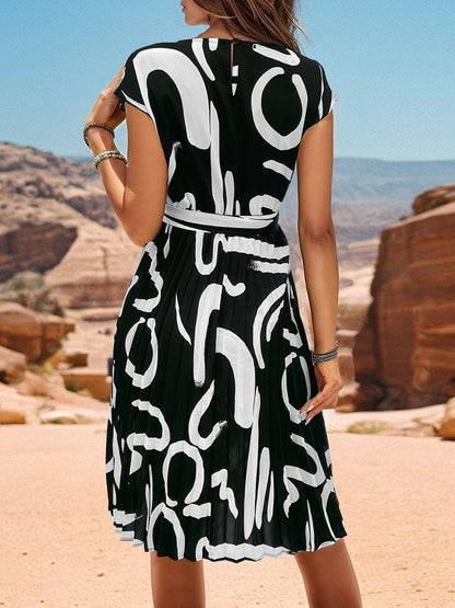 Printed Cap Sleeve Tie Waist Dress.