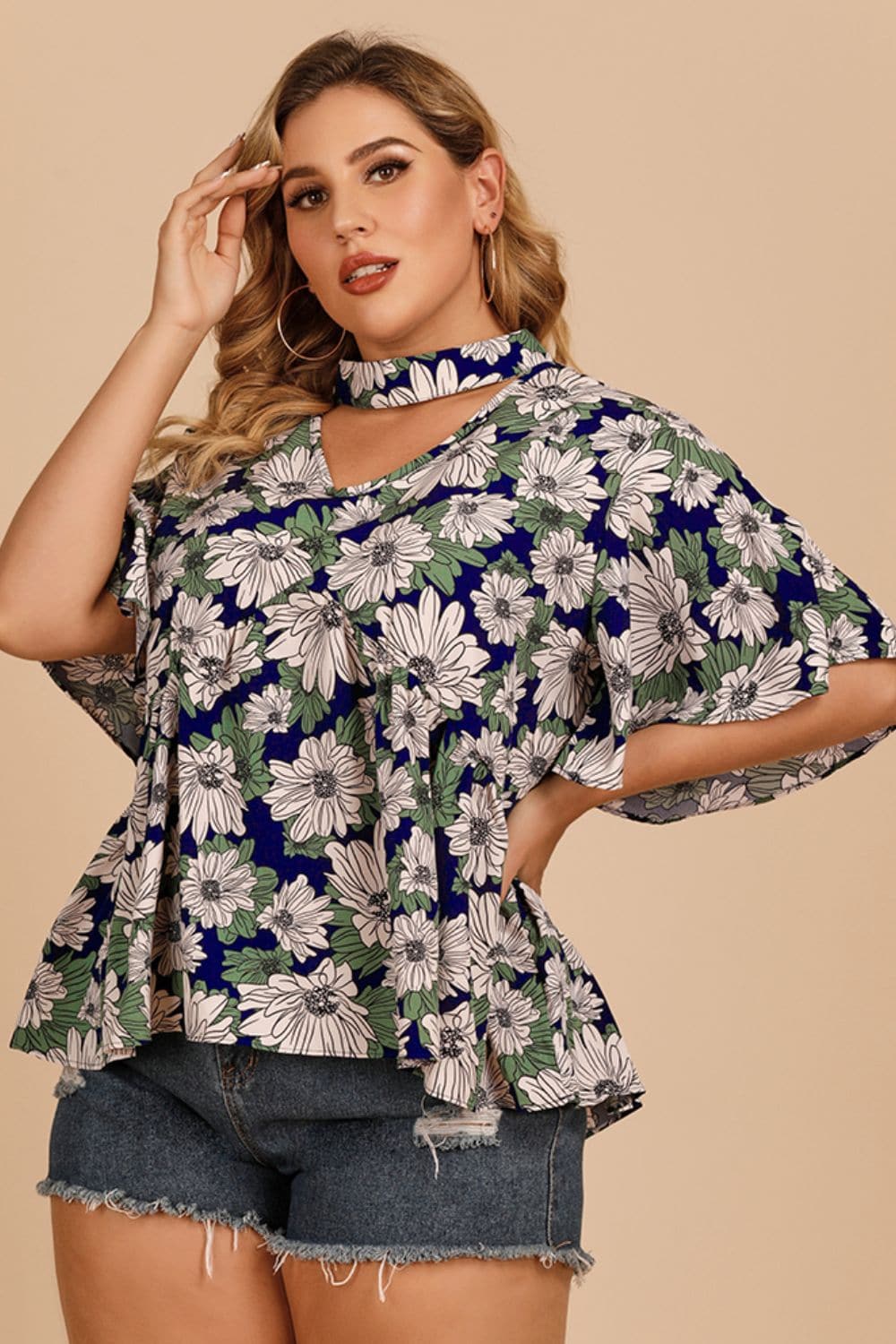 Plus Size Floral Flutter Sleeve Cutout Blouse.