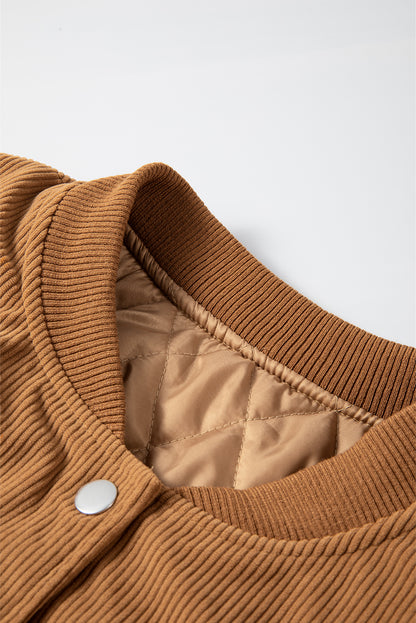 Buckskin corduroy fleece bomber with ribbed collar and quilted interior.