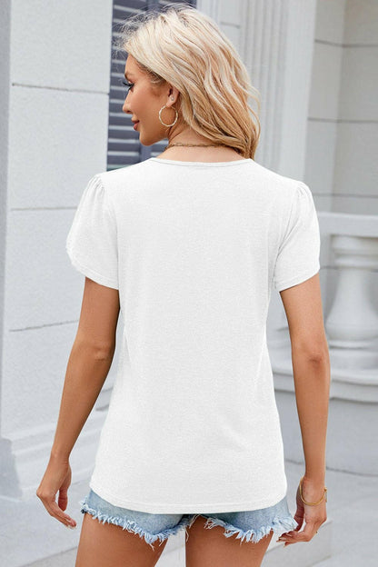 Chic V-Neck T-Shirt with Decorative ButtonsUpgrade Your Style with Our Chic V-Neck T-Shirt
 
 
Chic Design: Elevate your wardrobe with decorative buttons and a trendy V-neck.
 
Versatile: Whether for a casualLove Salve Decorative Buttonsjust arrived