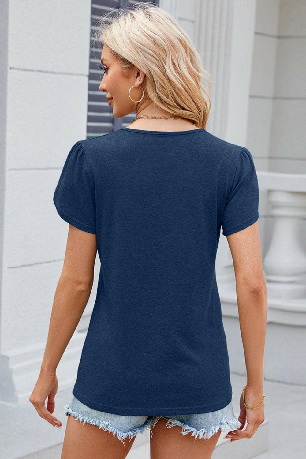 Chic V-Neck T-Shirt with Decorative ButtonsUpgrade Your Style with Our Chic V-Neck T-Shirt
 
 
Chic Design: Elevate your wardrobe with decorative buttons and a trendy V-neck.
 
Versatile: Whether for a casualLove Salve Decorative Buttonsjust arrived