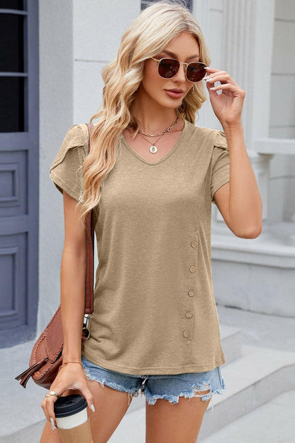 Chic V-Neck T-Shirt with Decorative ButtonsUpgrade Your Style with Our Chic V-Neck T-Shirt
 
 
Chic Design: Elevate your wardrobe with decorative buttons and a trendy V-neck.
 
Versatile: Whether for a casualLove Salve Decorative Buttonsjust arrived